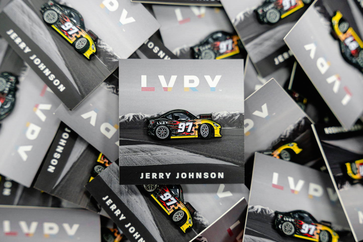 Promotional materials with 'LVRY' and 'Jerry Johnson' branding featuring a car on a mountain background.