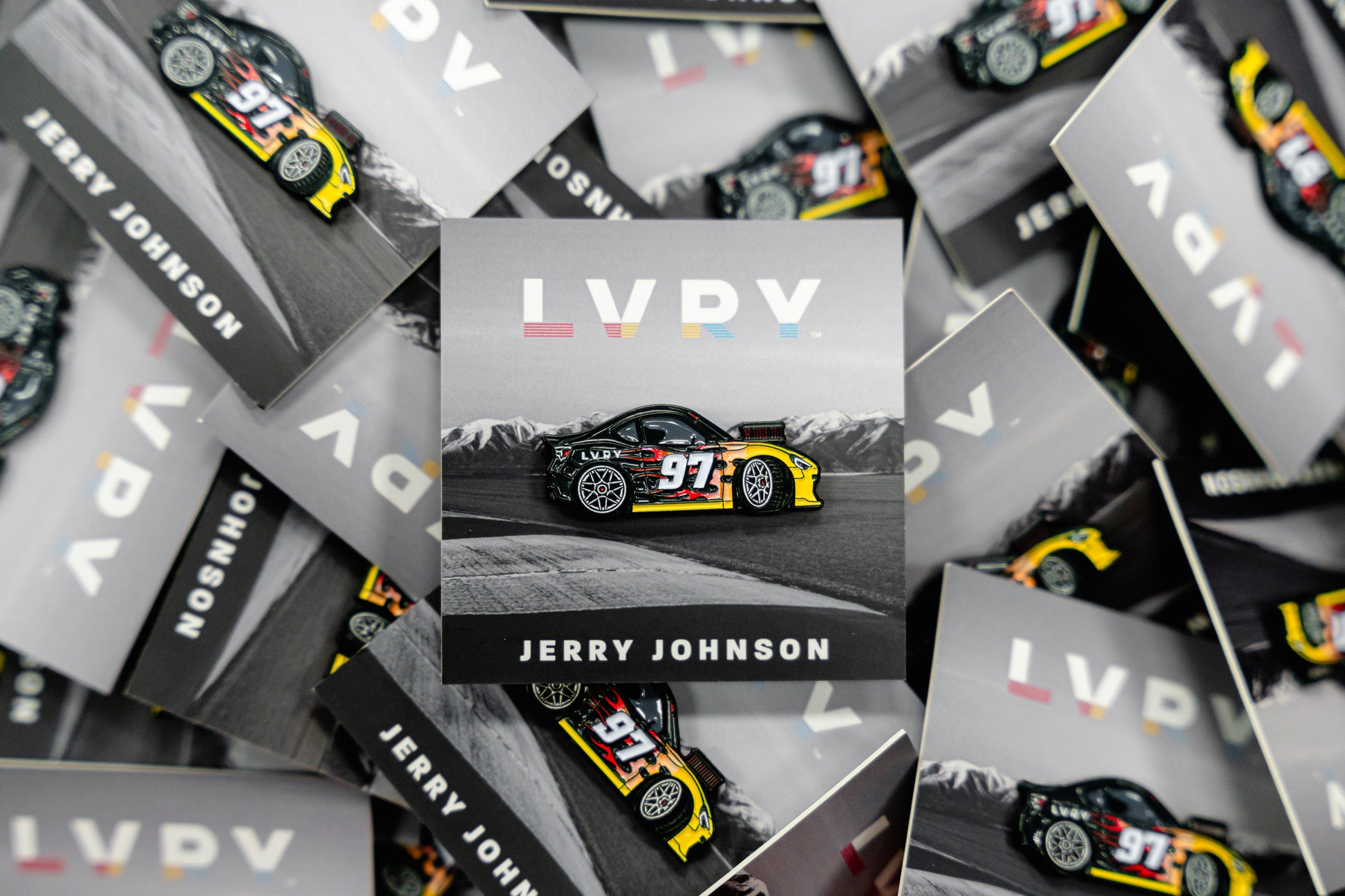 Promotional materials with 'LVRY' and 'Jerry Johnson' branding featuring a car on a mountain background.